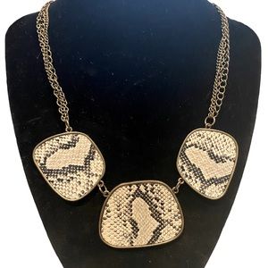 Modern antique gold mixed metals statement necklace with snake skin accent